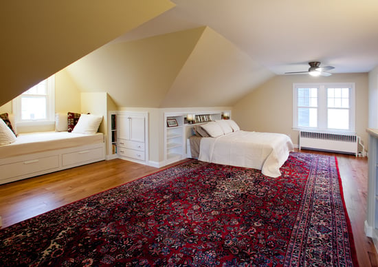 Remodeled attic space with window bench in Minneapolis, MN by Hanson Remodeling